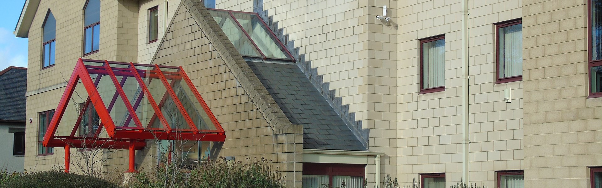 Front of CMA House Building with Cornish Mutual Sign